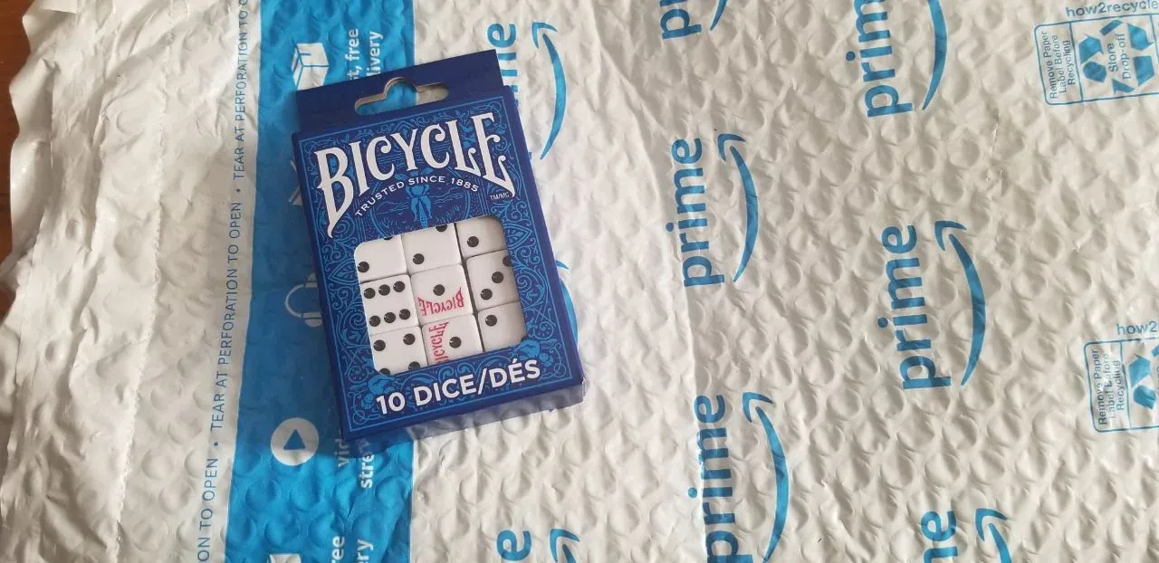 Photograph of the dice pack I used for diceware rolls including the shipping packaging.